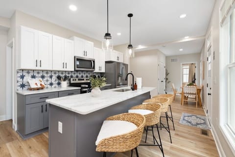 Large kitchen island with seating—perfect for meals or gathering together.