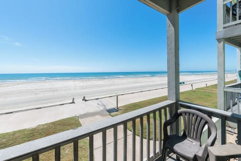 Step onto your private balcony and breathe in the salty ocean breeze while gazing at endless white sand and rolling waves.