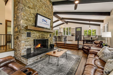 Living Area w/ Wood Burning Fireplace and Smart TV