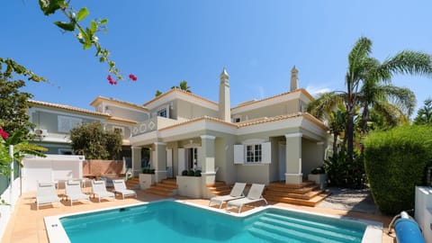 Enjoy the private pool of the villa, offering a spacious and comfortable area to relax under the Algarve sun.