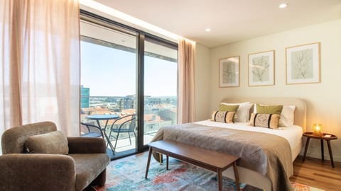 Soft tones and botanical art create a peaceful atmosphere, complemented by a private balcony overlooking the city. #BalconyViewStay #GaiaGetaway #SereneCityEscape