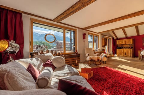 Apartment, Balcony, Mountain View | Living area | Flat-screen TV, fireplace