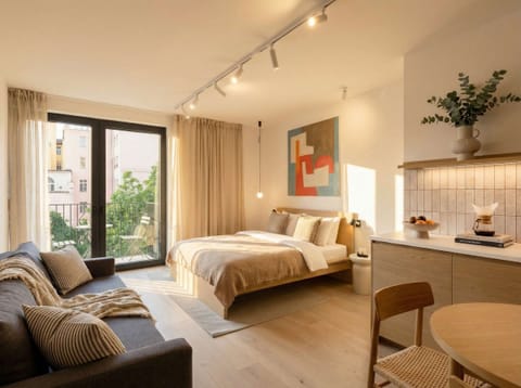 Apartment with two bedrooms. This is a second bedroom with queen size bed, convertible sofa bed and access to the balcony