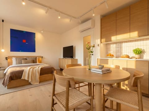 The apartment is equipped with queen size bed, convertible sofa and kitchen with dinning area