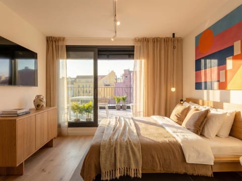 Second bedroom of the penthouse with access to spacious terrace
