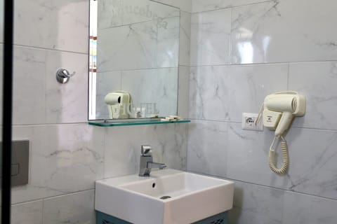 Free toiletries, hair dryer, slippers, towels