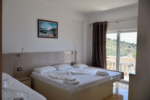 Quadruple Room, Balcony, Sea View | Premium bedding, desk, laptop workspace, free cribs/infant beds