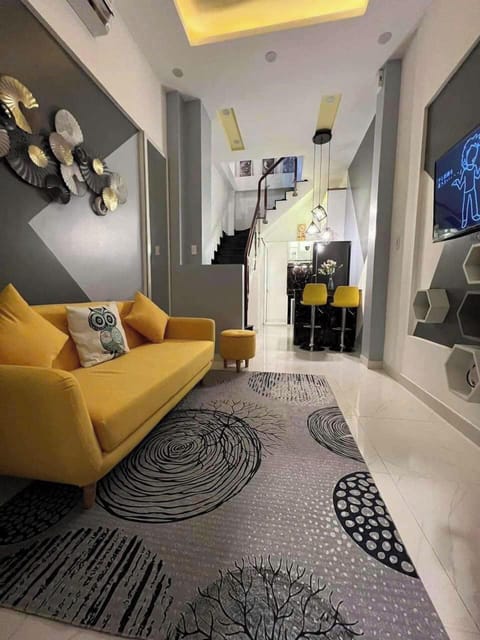 Family Apartment, 3 Bedrooms, Balcony, City View | Living area | 40-inch flat-screen TV with premium channels