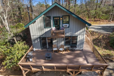 Gather around the firepit on the expansive deck while enjoying panoramic, stunning views that make every moment unforgettable.