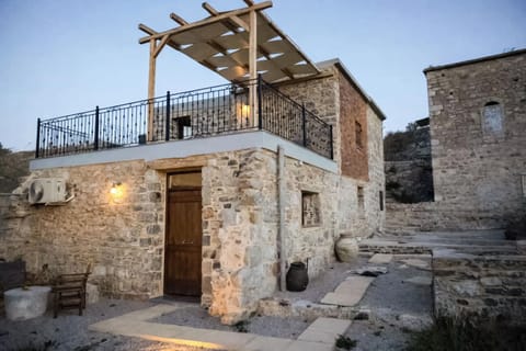 Traditional Stone House Exterior with Courtyard and Entrance