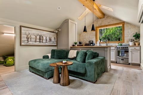 Cozy Living Room with 55-inch Smart TV, Fireplace, and bistro table.