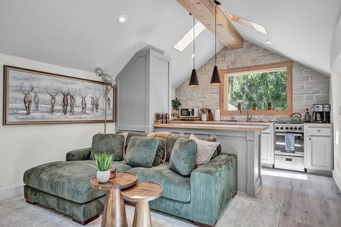 Cozy Living Room with 55-inch Smart TV, Fireplace, and bistro table.