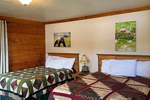 The room features a queen and full bed. 