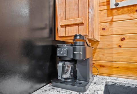 Convenient coffee station with Keurig, drip brewer, and all the essentials for your morning pick-me-up.