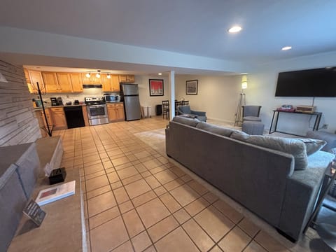 Spacious open living area with kitchen, dining, and living room