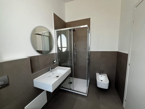Room, City View | Bathroom | Shower, rainfall showerhead, hair dryer, slippers