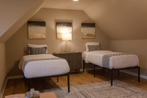 2 twin XL upstairs could be master suite if pushed together