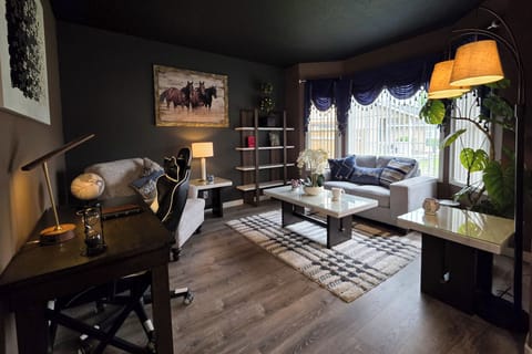 Front entry room with desk, loveseat, accent chair, and coffee tables!