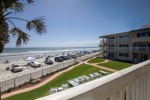 Enjoy breathtaking ocean views right from your balcony. Just steps from the sand, this beach stay offers the perfect spot to relax, sunbathe, and soak in the coastal beauty.