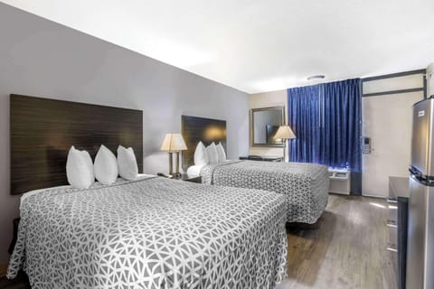 Desk, blackout drapes, iron/ironing board, rollaway beds