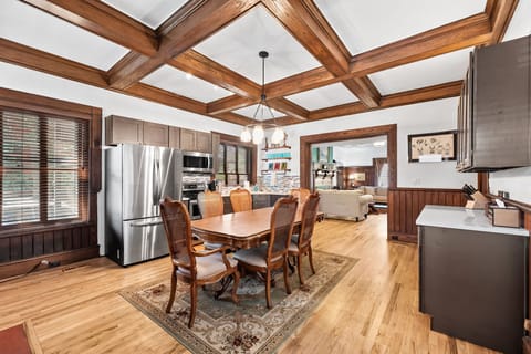 Dining Room with Rich Wood Accents and Seating for Six