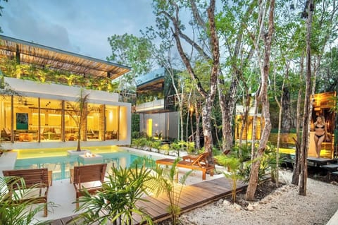 Villa, pool, glasshouse view