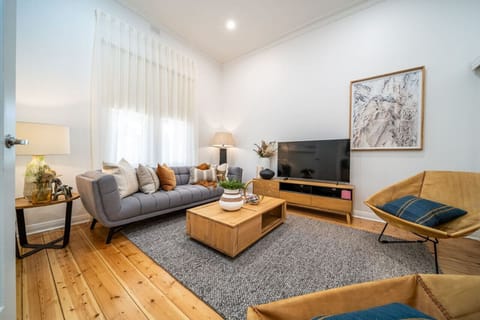 Comfortable seating and a large TV in the living area make it easy to relax at the end of the day.