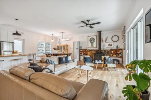 The spacious open-plan layout brings everyone together with flowing living, dining, and kitchen spaces designed for shared meals, relaxed evenings, and easy connection throughout your stay.