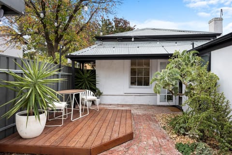 Welcome to your charming city escape – step onto the deck and into a space where comfort meets character.