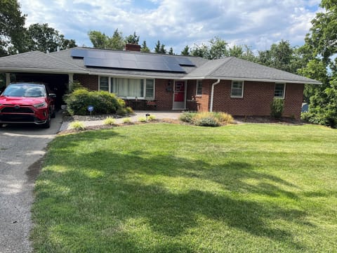 Front of House with Carport