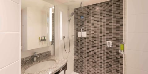 Combined shower/tub, free toiletries, hair dryer, bathrobes