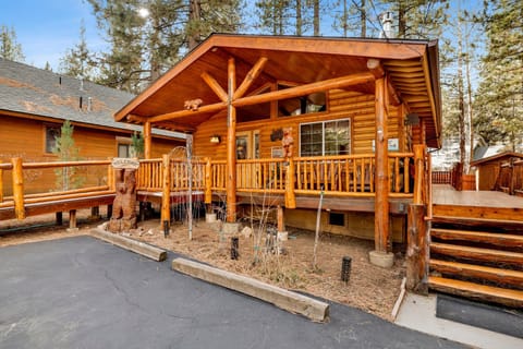 Arrive with ease using the private driveway, located just steps from the front door. Please note that the main entrance is accessed via exterior stairs, adding to the classic mountain-cabin feel.