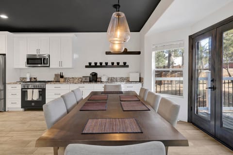 Inviting dining area designed for comfort and connection. The space feels open and airy, with a warm atmosphere that makes everyday meals and special gatherings equally enjoyable. A clean, timeless style blends effortlessly with the rest of the home, creating a cozy yet refined setting where conversations flow and memories are made.