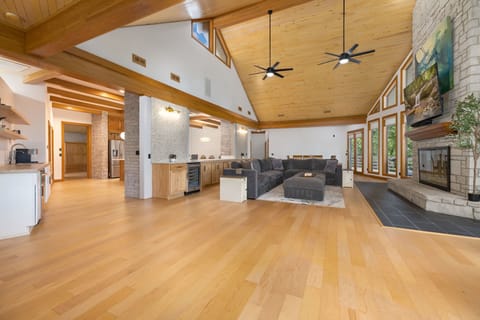 Open living space with a large, cozy couch and Smart TV.