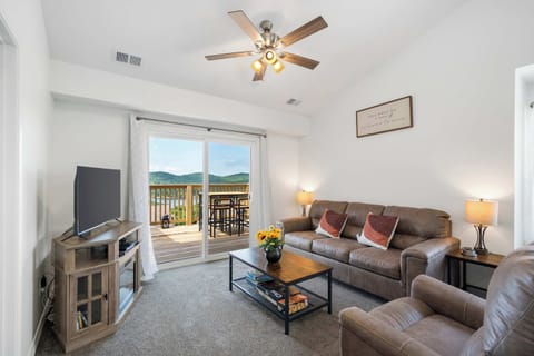 Curl up in the breezy living room & stream your favorites on the smart TV​