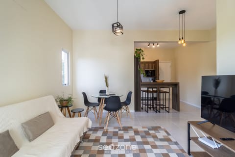 Basic Apartment | Living area | 32-inch Smart TV with digital channels