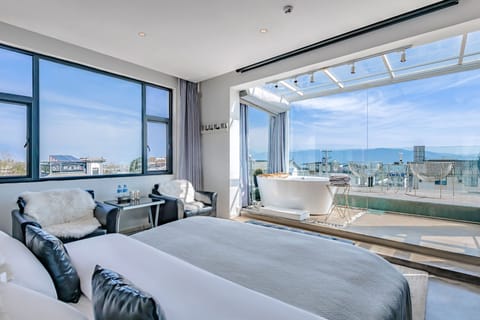 Superior Double Room | Minibar (free items), desk, laptop workspace, blackout drapes