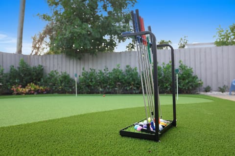 Tee off in style at this Delray Beach vacation rental featuring a private putting green—perfect for golf lovers and outdoor fun.