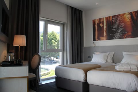 Twin Room | 1 bedroom, premium bedding, down comforters, pillowtop beds