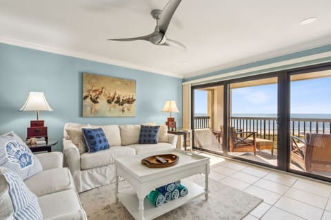 Living room with sliding glass door to balcony