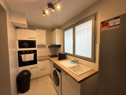 Microwave, stovetop, espresso maker, cookware/dishes/utensils