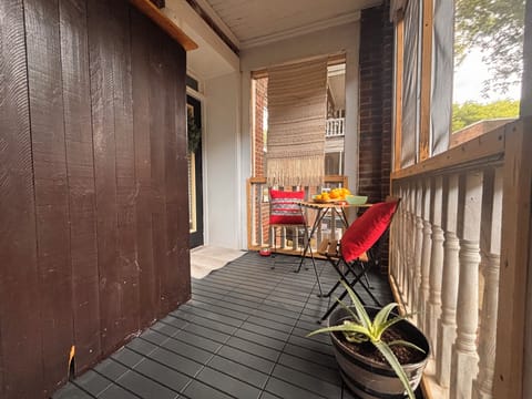 Enclosed and inviting, this little balcony nook