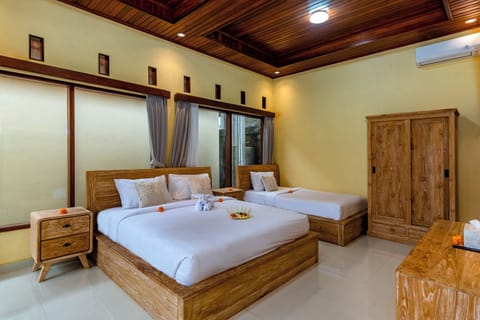 Deluxe Triple Room, Multiple Beds, Pool View | Free WiFi