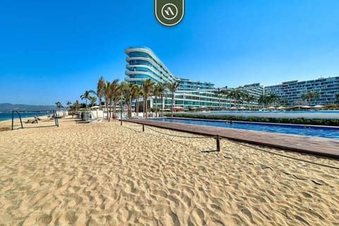 Step directly onto the golden sands. Our property offers prime access to the beach and luxury resort amenities, including a stunning pool and manicured grounds just steps away.