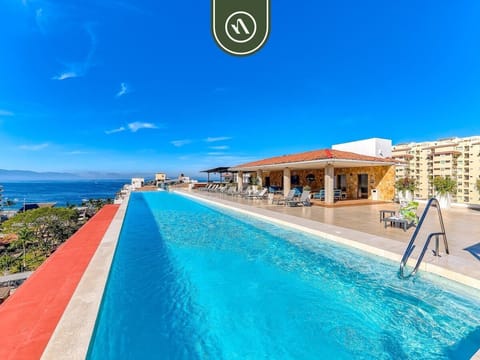 Dive into relaxation! Our gorgeous infinity pool offers breathtaking panoramic views of the ocean and bay. It's the absolute perfect place to soak up the sun.
