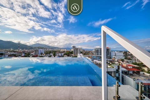 Swim in this stunning rooftop infinity pool offering breathtaking panoramic views of the city and mountains.