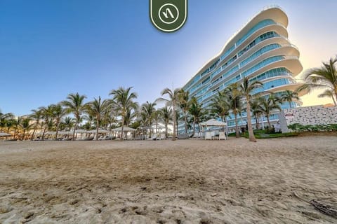 Wake up to stunning beachfront scenery and enjoy direct access to a modern resort setting surrounded by palm-lined shores and ocean breezes.