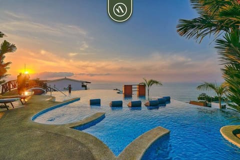 Experience unforgettable sunsets from our breathtaking infinity pool. Relax in the water while enjoying panoramic views of the ocean horizon.