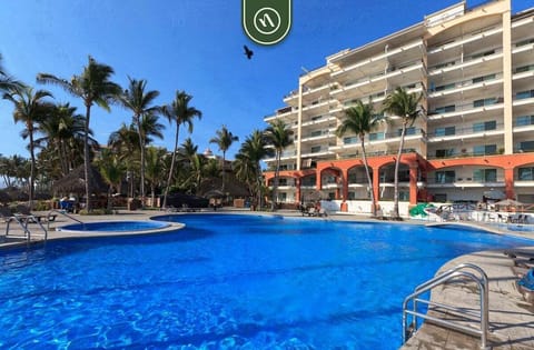 Enjoy access to the resort's sparkling pool surrounded by tropical landscaping, lounge areas, and stunning beachfront scenery.