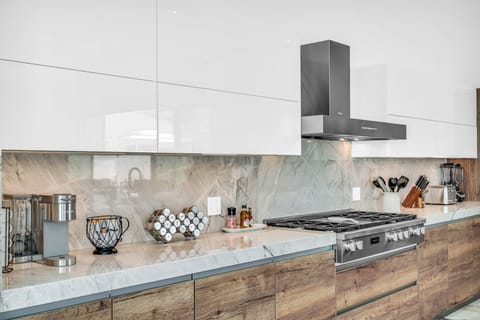 The kitchen features modern appliances.